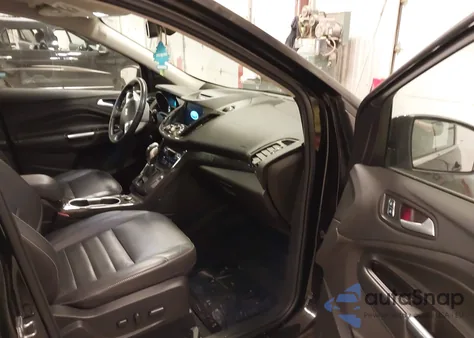 2016 Ford Escape Titanium z USA, uszkodzony, nr VIN 1FMCU9JX1GUB11009